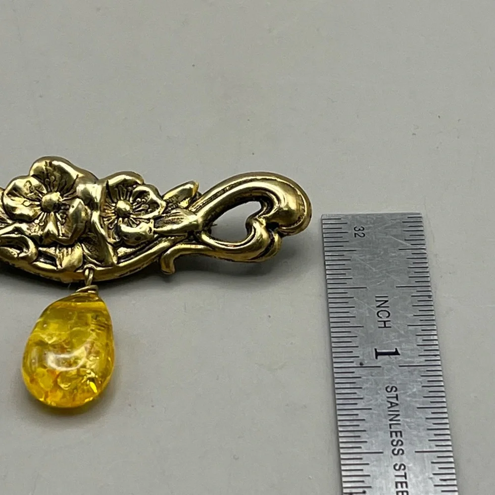 Elegant Gold Tone Floral Brooch with Amber Drop Antique Jewelry Statement Piece